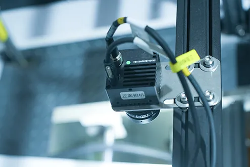 Register mark sensor tracking the printed web on a CI flexographic press